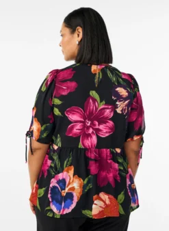 Bluse mit geblümtem Print und Peplum