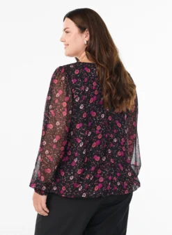 Geblümte Bluse aus Chiffon mit transparenten Ärmeln