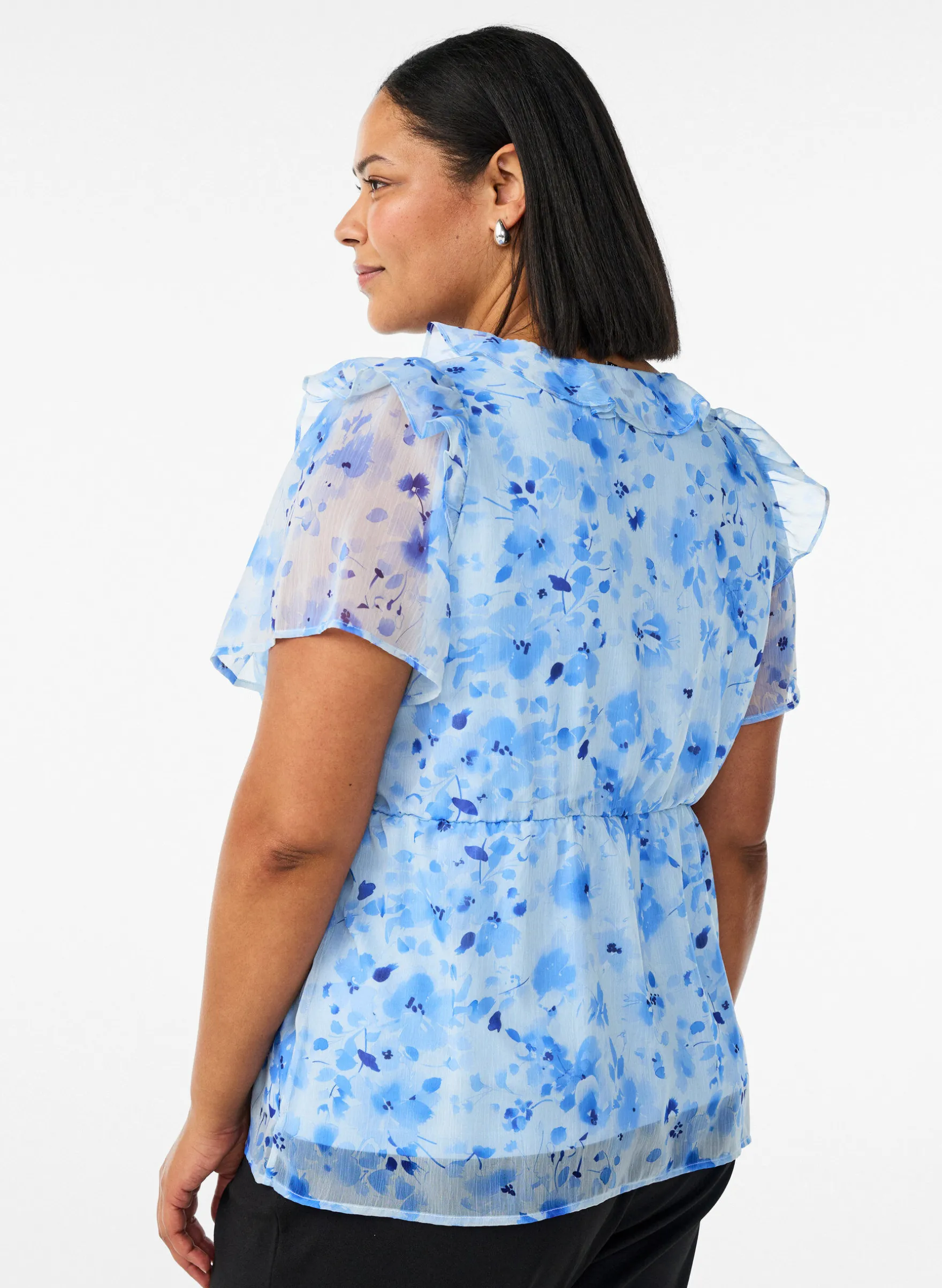 Geblümte Bluse mit Rüschenkragen und Peplum-Effekt