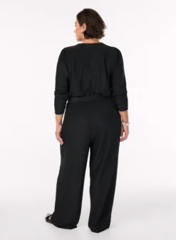 Jumpsuit mit Glitzer und Bindegürtel