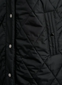 Lange Steppweste mit Druckknöpfen