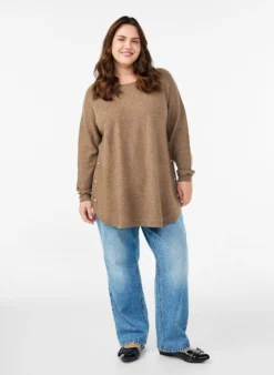 Lange Strickbluse mit Kugelknöpfen