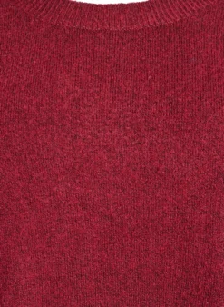 Lange Strickbluse mit Kugelknöpfen
