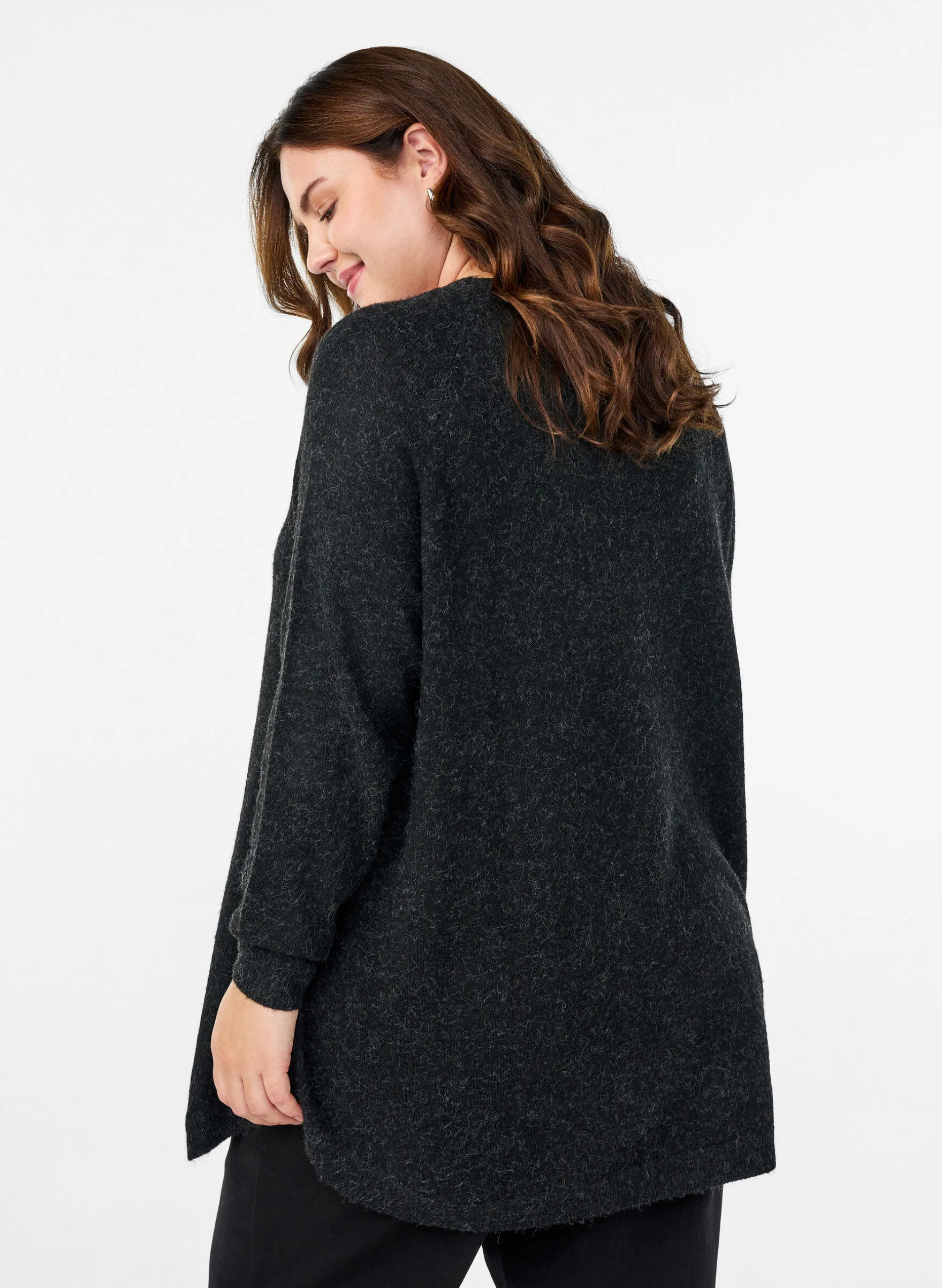 Lange Strickbluse mit Kugelknöpfen